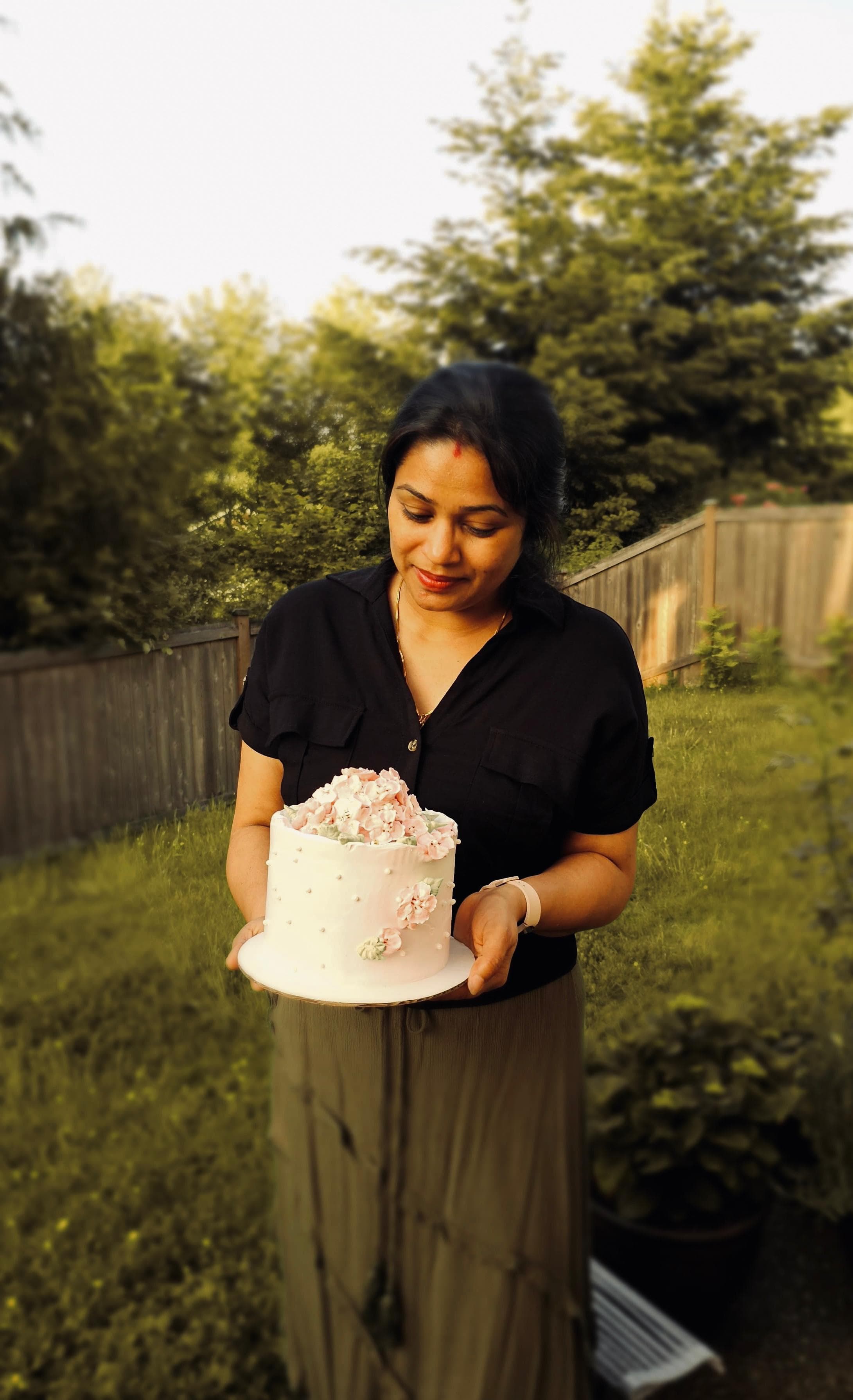 Baker crafting beautiful cakes in the kitchen